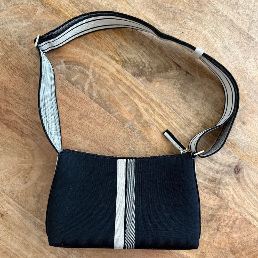 Rothy’s The Casual Crossbody in Black and Ivory Stripe